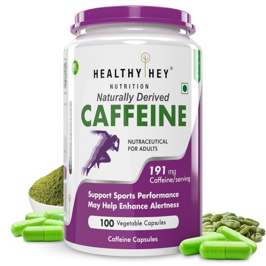 Container of Healthy Hey Nutrition caffeine supplement with green powder and capsules on a white background