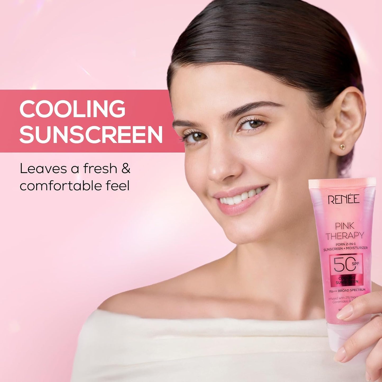 Woman holding a pink sunscreen tube with 'RENEE' branding on a pink background