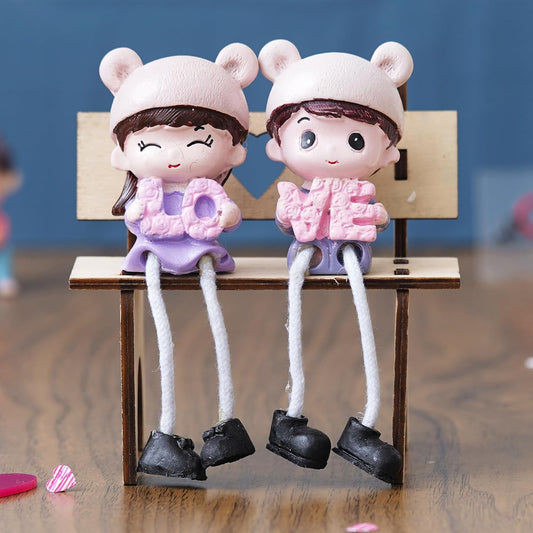 Cute Couple Sitting on Beanch Holding Love Decorative Showpiece - Valentine Gift for Girlfriend, Boyfriend, Husband, Wife (Polyresin, Multicolor)