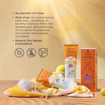 Sunscreen products with packaging on a sandy background, featuring text about harmful UV filters and toxin-free ingredients.