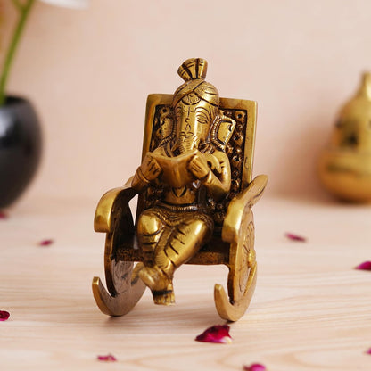 Golden Brass Handcrafted Lord Ganesha Statue Sitting on a Chair and Reading a Book Decorative Showpiece | Divine God Idol for Home, Office Decor, and Gifts