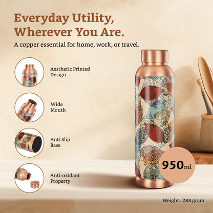 Copper water bottle with artistic design on a beige background, featuring text about its features and capacity.