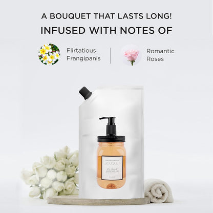 Bottle of soap with packaging and flowers on a white background