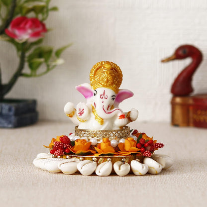 Polyresin Lord Ganesha Idol On Shells and Orange Floral Decorative Handcrafted Plate - Exquisite Hindu God Statue for Home, Temple, Office, Car Dashboard - Gift for Housewarming, Birthday