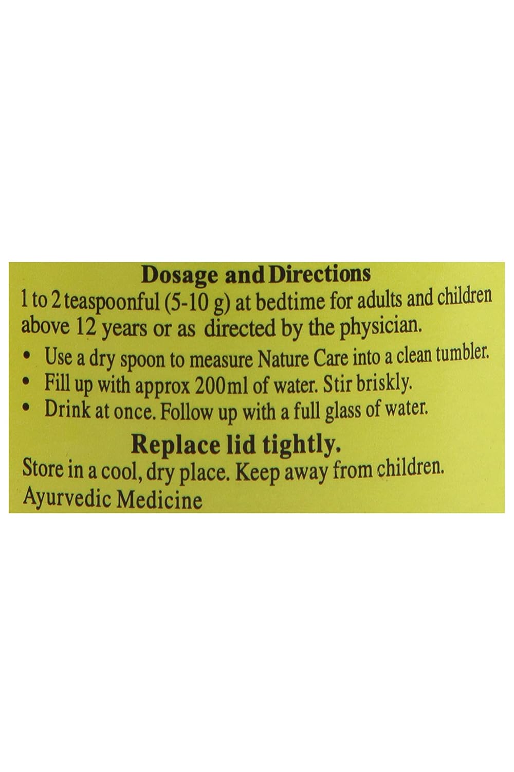 Yellow label with dosage and directions text on a white background