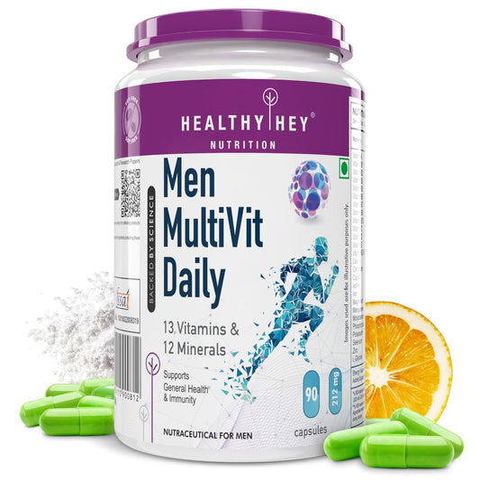 Men's multivitamin supplement container with capsules and an orange slice on a white background