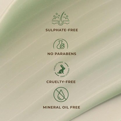 Green product packaging with certification icons for sulfate-free, no parabens, cruelty-free, and mineral oil-free on a green background.