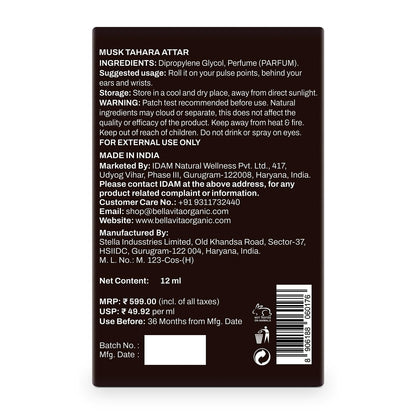 Back label of a Musk Tahara Attar product with text and barcode on a black background