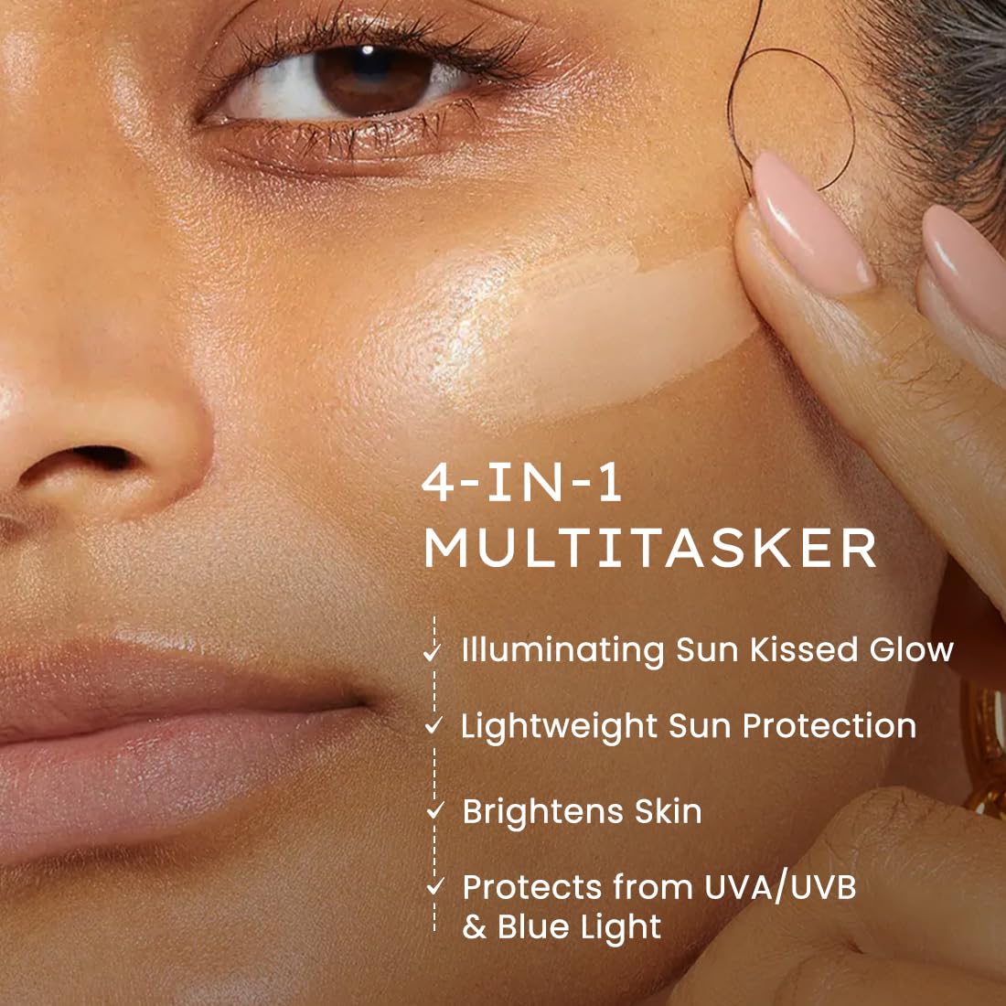 Close-up of a woman's face with a product application, highlighting '4-IN-1 MULTITASKER' with text about its benefits.
