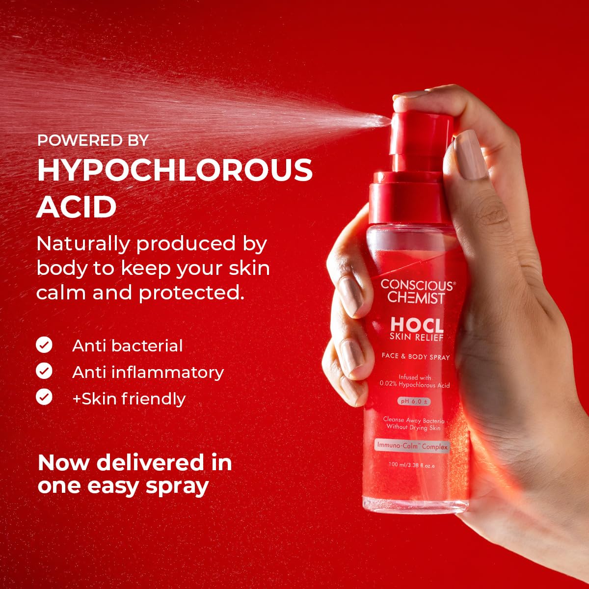 Hand holding a red spray bottle labeled 'Conscious Chemist' against a red background with text about hypochlorous acid.