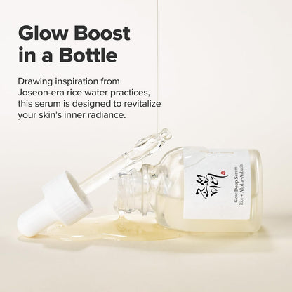 Serum bottle with dropper on a light background, labeled 'Glow Boost in a Bottle'.