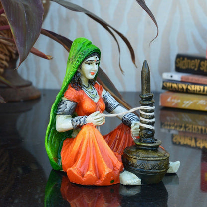 Rajasthani Lady Using Makhan Handi Polyresin Statue (10 cm x 12.5 cm x 15 cm)