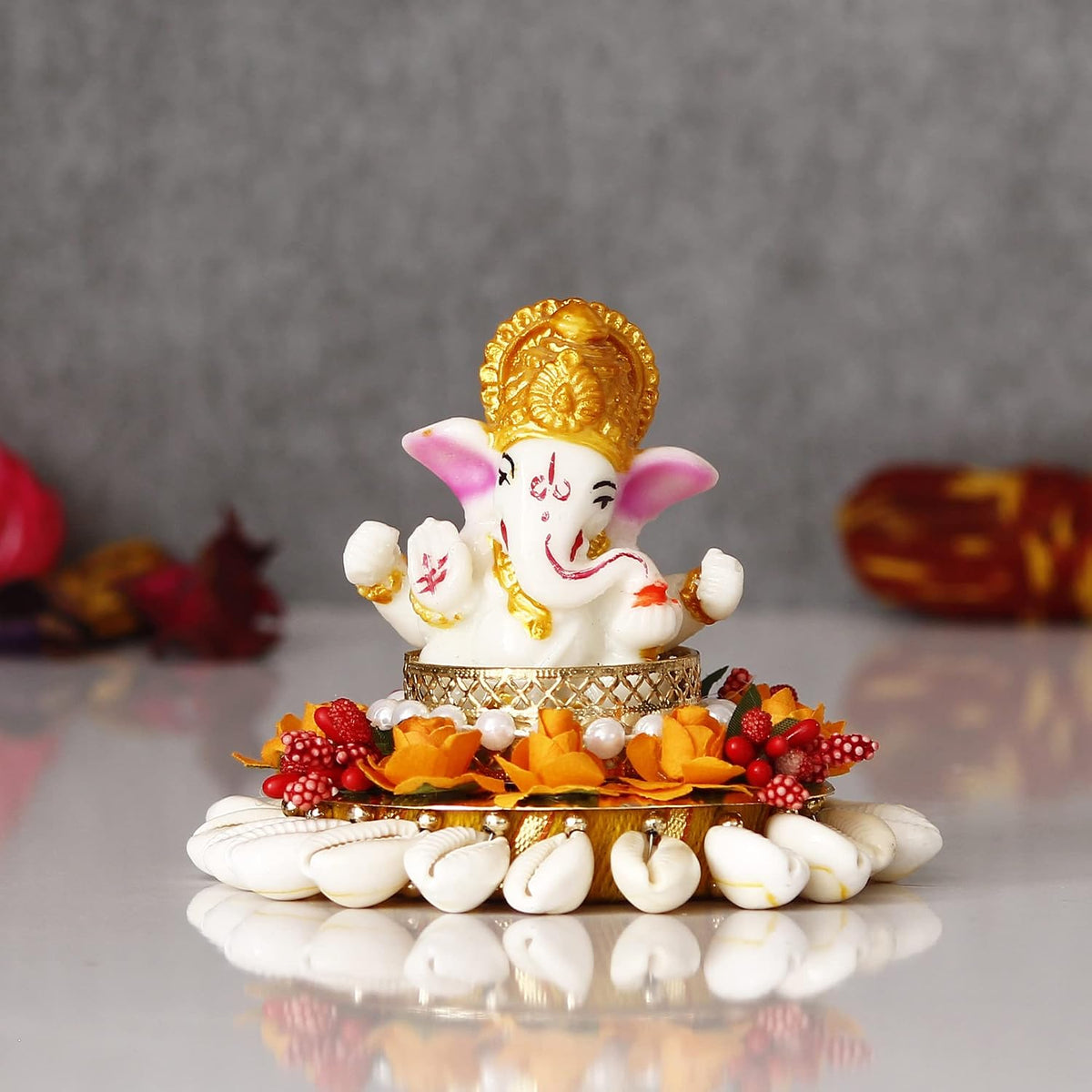 Polyresin Lord Ganesha Idol On Shells and Orange Floral Decorative Handcrafted Plate - Exquisite Hindu God Statue for Home, Temple, Office, Car Dashboard - Gift for Housewarming, Birthday