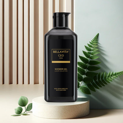 Black shower gel bottle with 'Bellavita' branding on a neutral background with greenery.