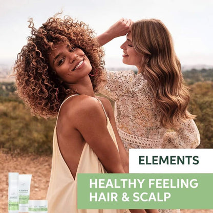 Two women outdoors with 'Elements' hair care products displayed.