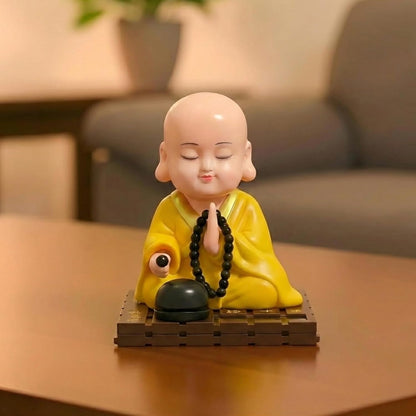 eCraftIndia Little Cute Buddha Monk Feng Shui Showpiece for Home Decor Office Car Dashboard | Moving Head and Hand Monk Buddha Statue for Positive Energy Money Luck Prosperity Gift (Plastic, Yellow)