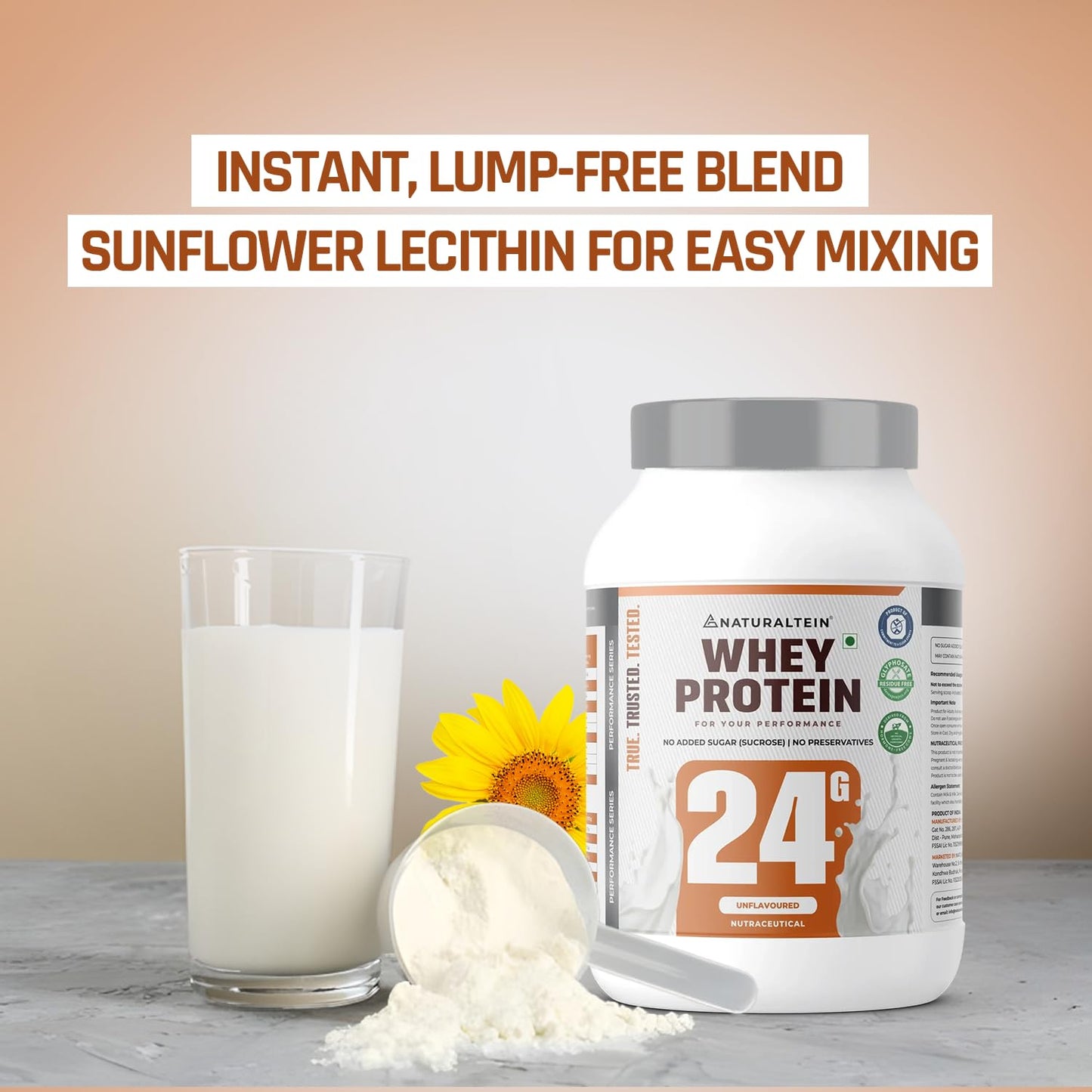 Whey protein container with a glass of milk and scoop of powder on a neutral background