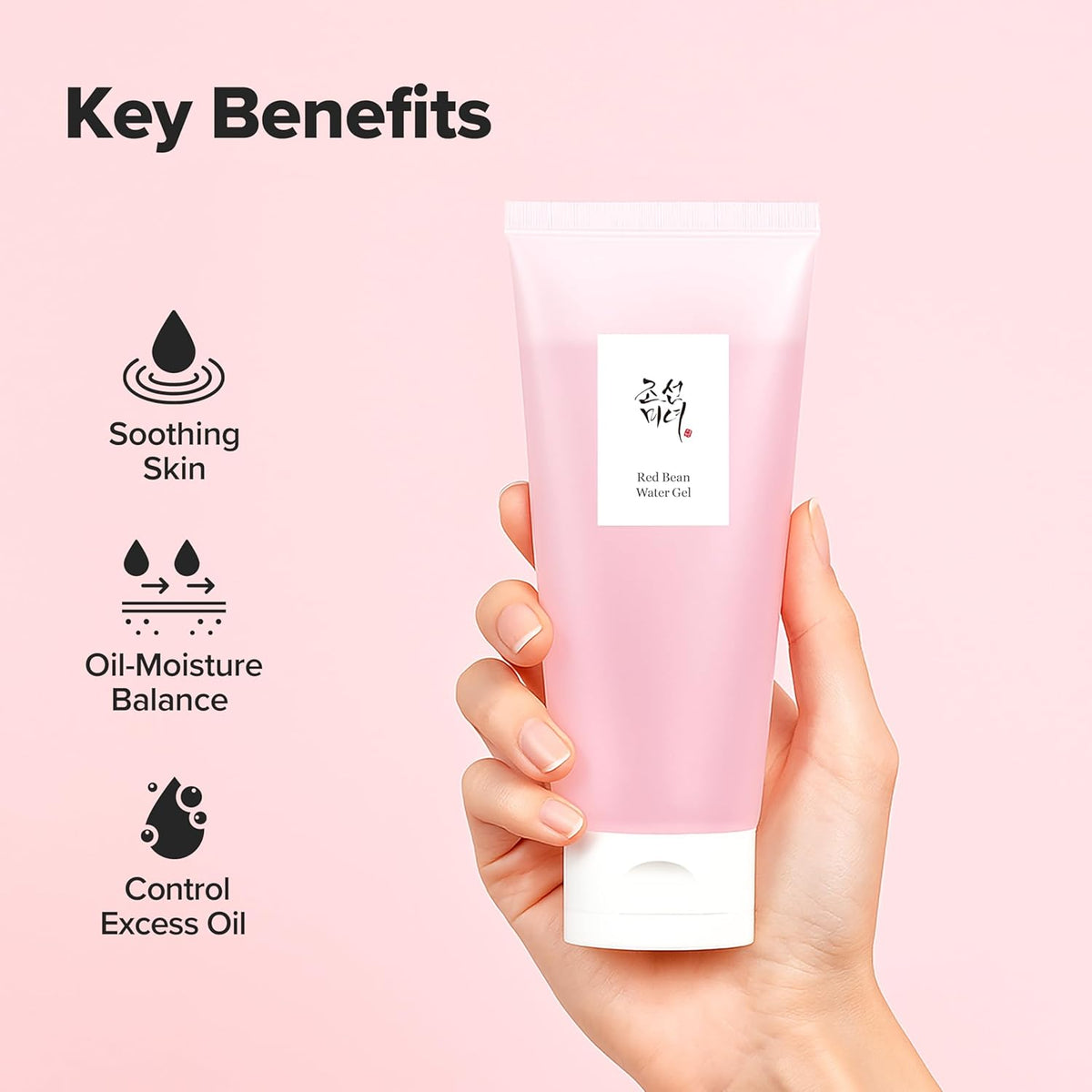Hand holding a pink tube of skincare product with key benefits listed on a pink background