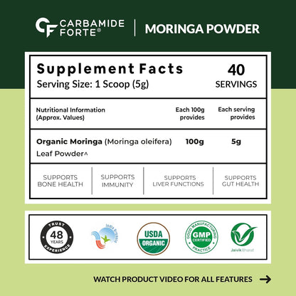 Supplement facts label for Carbamide Forte Moringa Powder on a green background