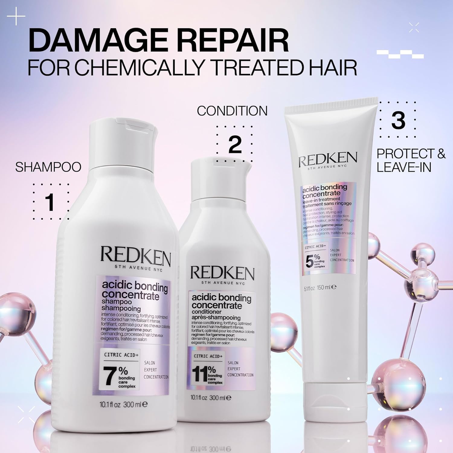 Redken hair care products for damage repair on a pink and white background