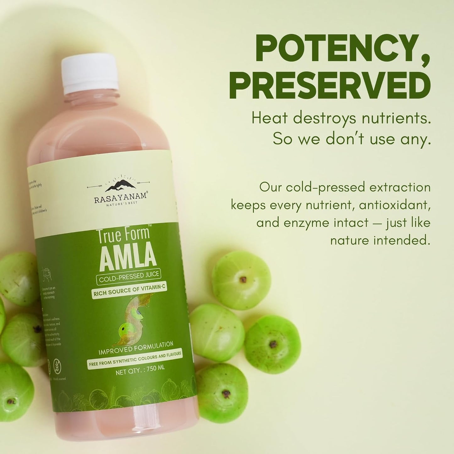 Bottle of Basavanam True Form Amla with green fruits on a light background