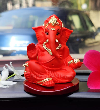 Handcrafted Poly Resin Ganesha Statue with Base - Perfect for Car Dashboard, Office Desk, Shelves, and Home Decor - Ideal Housewarming Gift! (GaddiOrangewithbase)