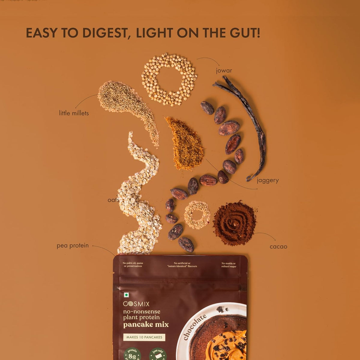 Cosmix pancake mix packaging with ingredients on a brown background