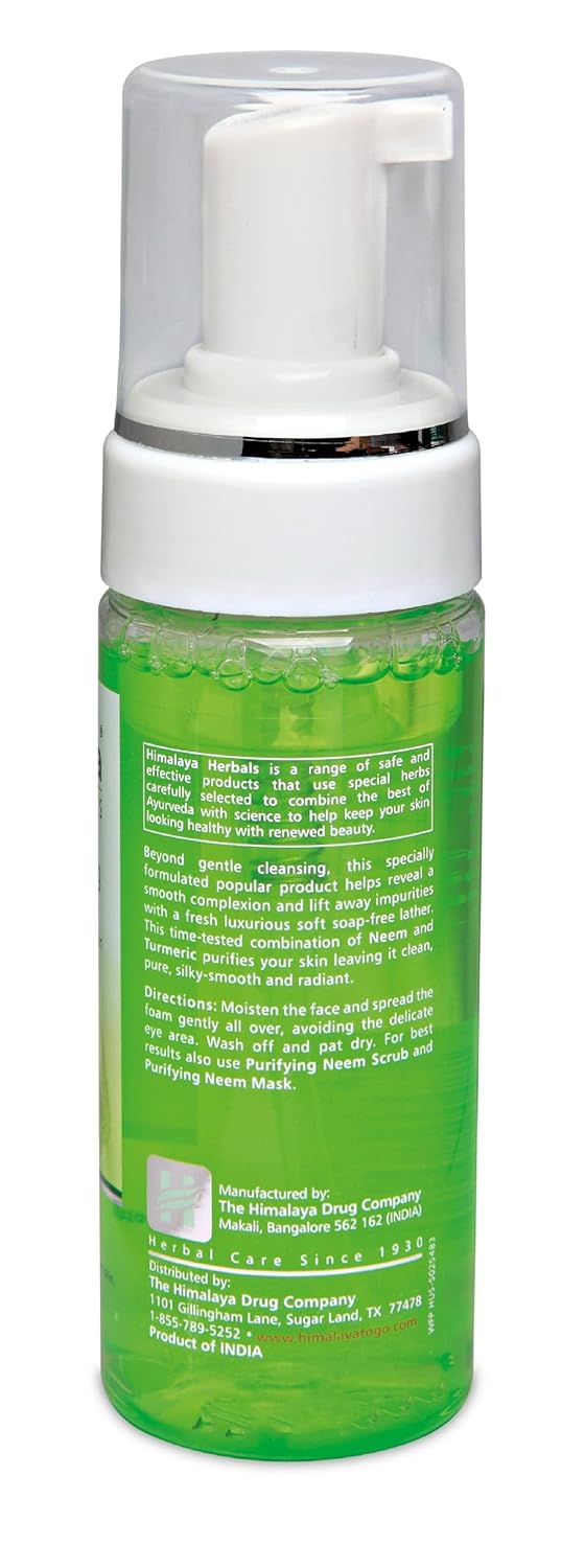 Green bottle with white pump on a white background