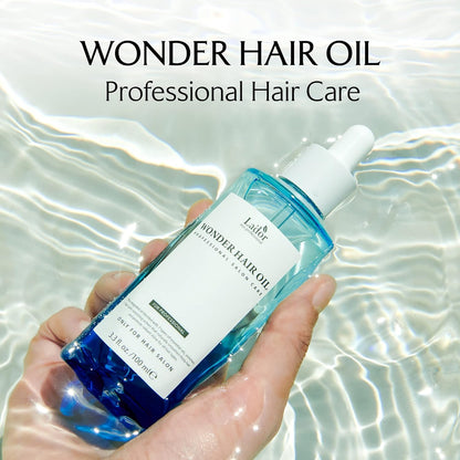 LADOR Wonder Hair Oil (100ml) Korean Lightweight Hair Oil with 7 Essential Plant Oil & Vitamin E, Deep Moisture, Frizz Control, Heat Protection & Shine Booster, Smooths Dry, Damaged Hair, Non-Greasy, Soft, Glossy Finish
