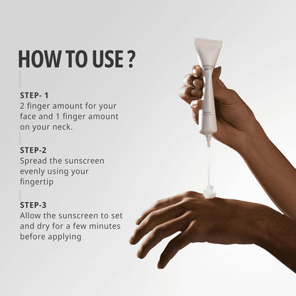 Hand holding a sunscreen applicator with usage instructions on a gray background