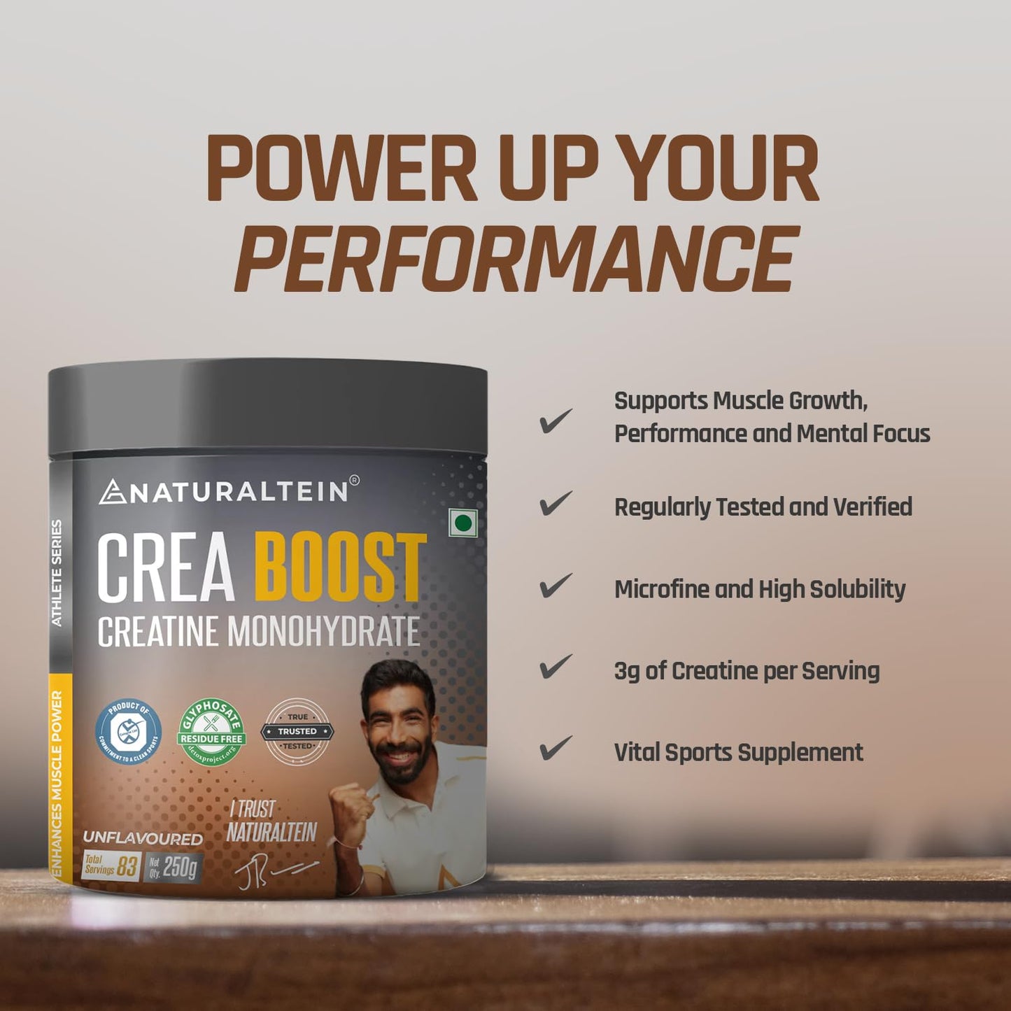 Naturaltein Crea Boost supplement container with promotional text on a wooden surface.