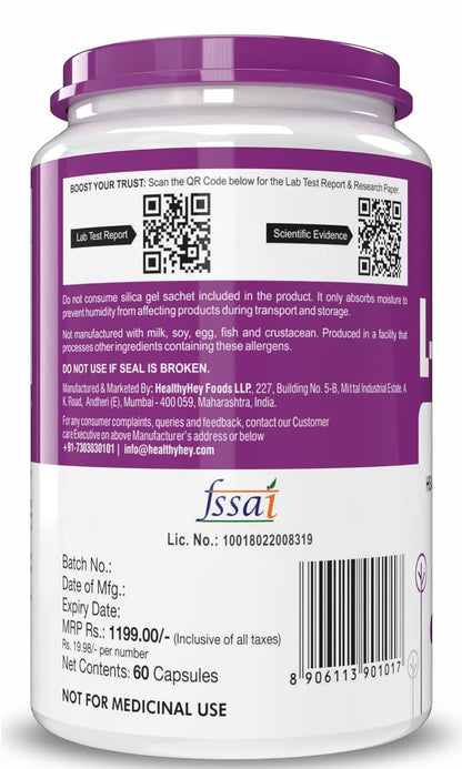 Supplement container with purple lid and white body, displaying labels and text.