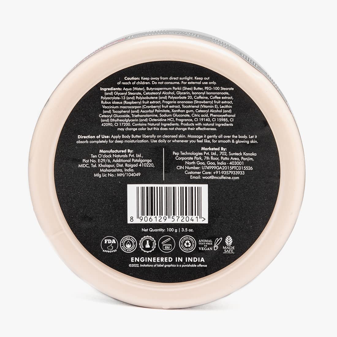 Back view of a cosmetic container with label and barcode on a white background