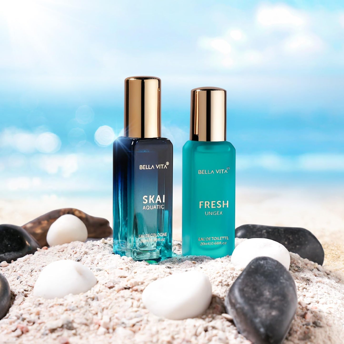 Two Bella Vita perfume bottles on a beach with a blue sky background