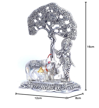Lavanaya Silver Lord Krishna with Cow Standing Under Tree Playing Flute Silver Plated Figurine (12x8x17cm), Floral