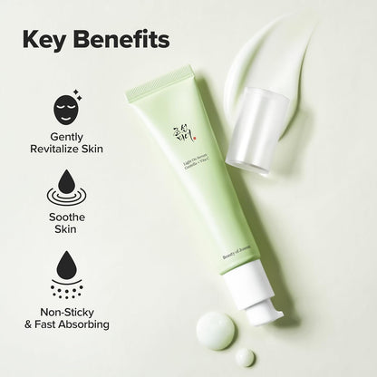 Skincare product with key benefits listed on a light background