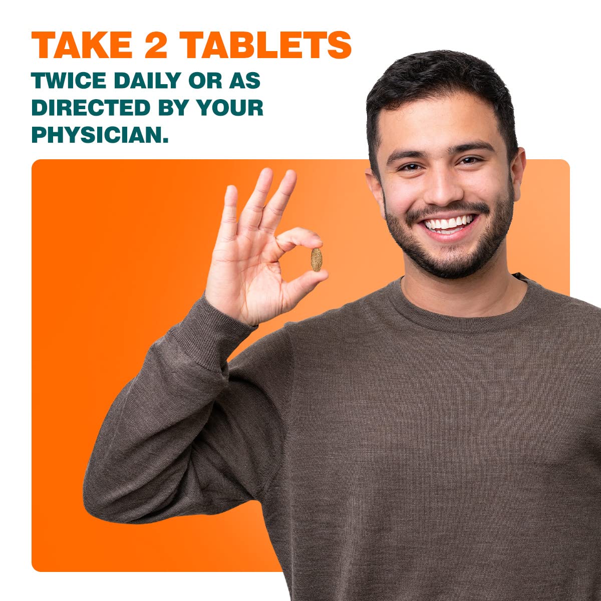 Man holding a pill with text about taking two tablets daily on an orange background