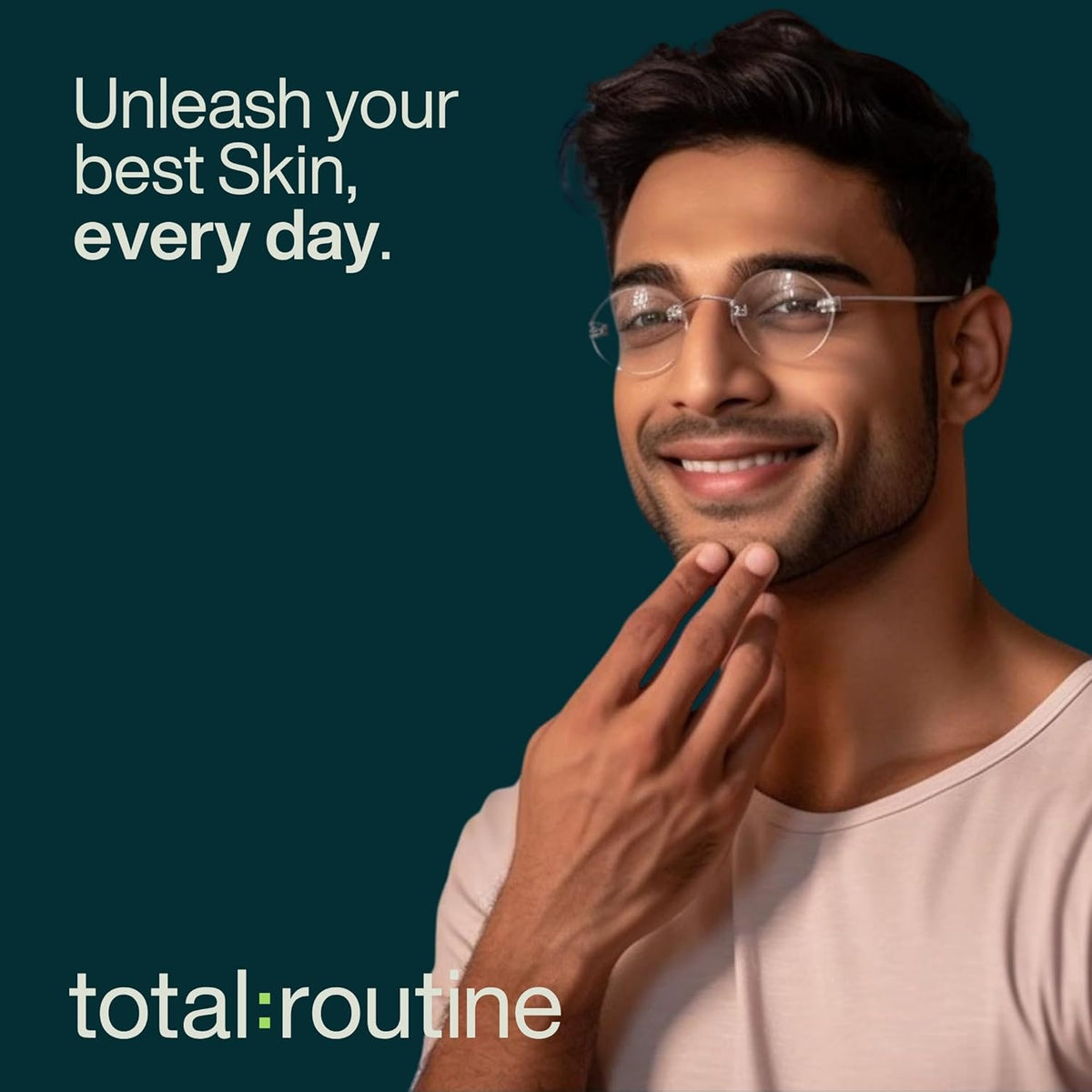 Man with glasses touching his chin against a dark teal background with 'total:routine' branding.