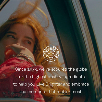Person with red hair leaning out of a car window with a quote and brand logo.