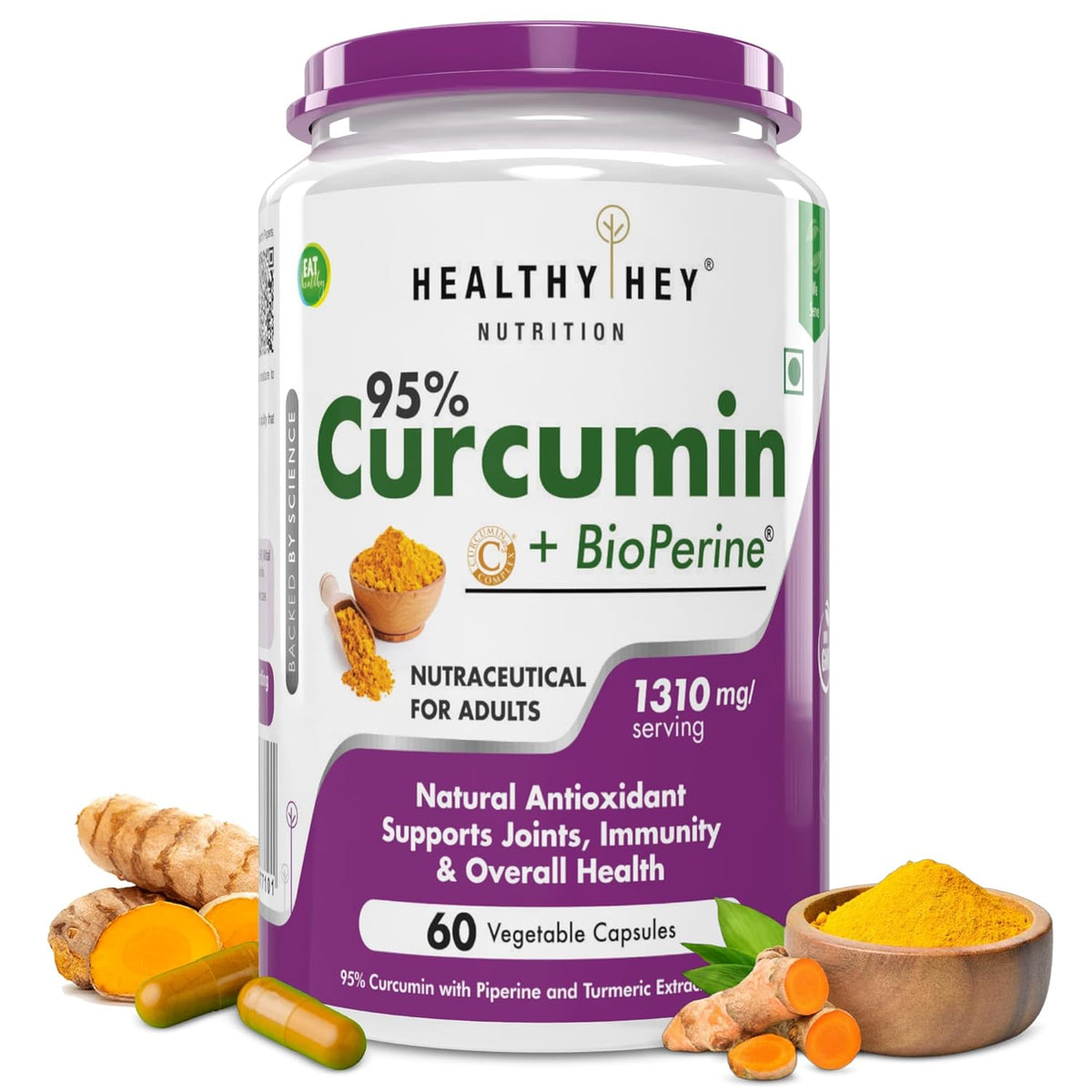 Healthy Hey Nutrition 95% Curcumin supplement bottle with turmeric roots and powder on a white background
