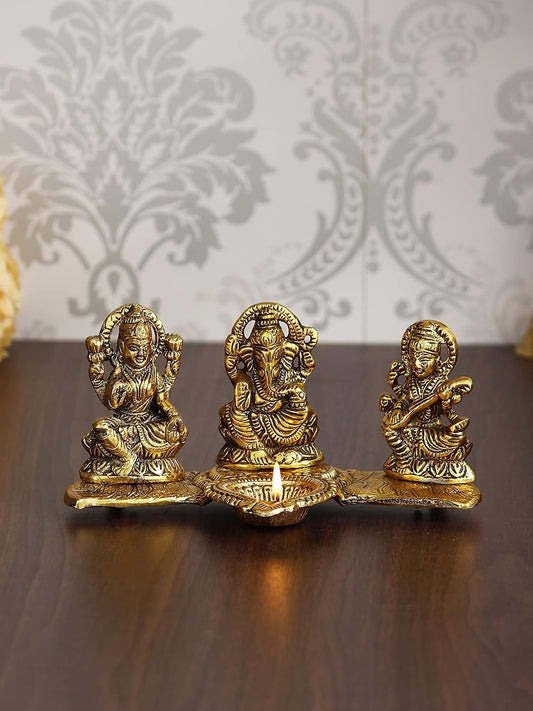 Golden Metal Handcrafted Lakshmi Ganesha Saraswati Idols with Diya On Leaf Chowki - Auspicious Decorative Idols & Diyas for Puja Room, Home, Office, Temple - Gift for Diwali, Housewarming