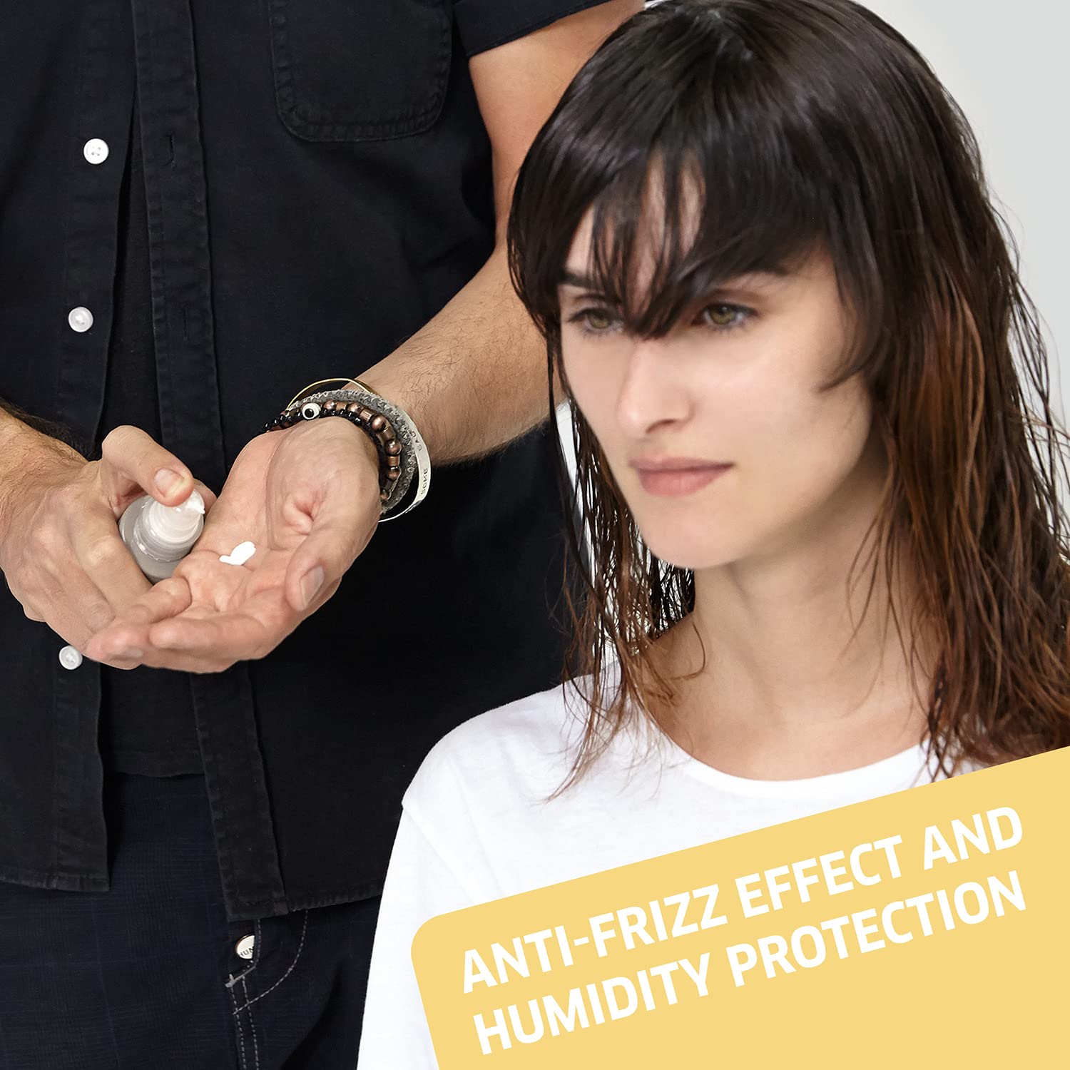 Person applying hair product to a woman's hair with text about anti-frizz effect and humidity protection.