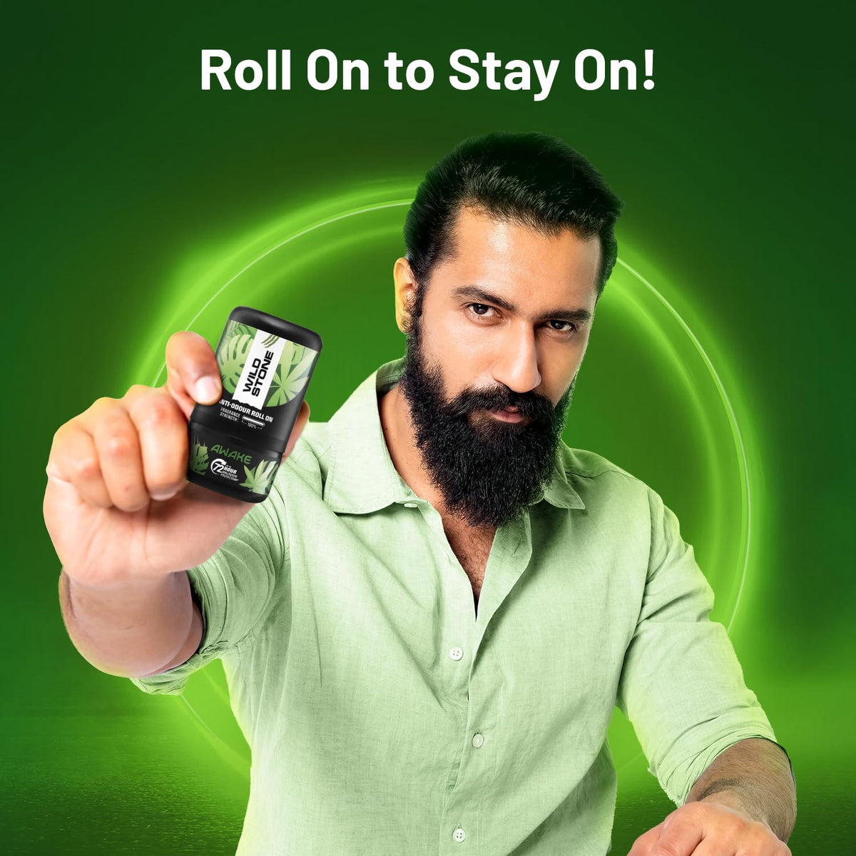 Man holding a product with text 'Roll On to Stay On!' on a green background