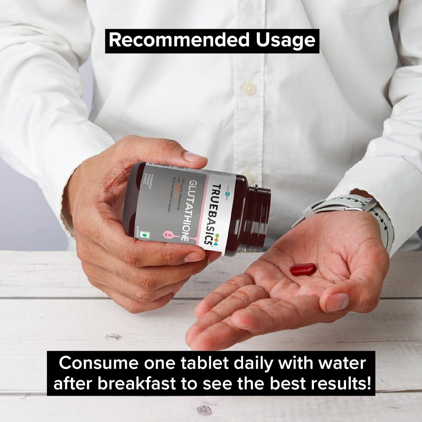 Person holding a supplement bottle and a pill with text on recommended usage.