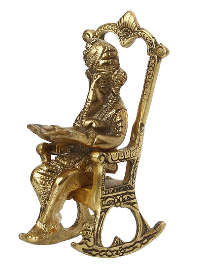 Golden Metal Lord Ganesha Idol Reading Book On Rocking Chair - Decorative Hindu God Statue for Home Decor - Gift for Diwali, Housewarming - Ideal for Living Room, Office, Study Areas