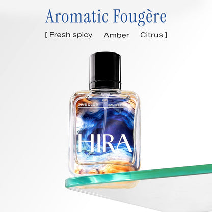 Perfume bottle labeled 'HIRA' with 'Aromatic Fougère' description on a white background