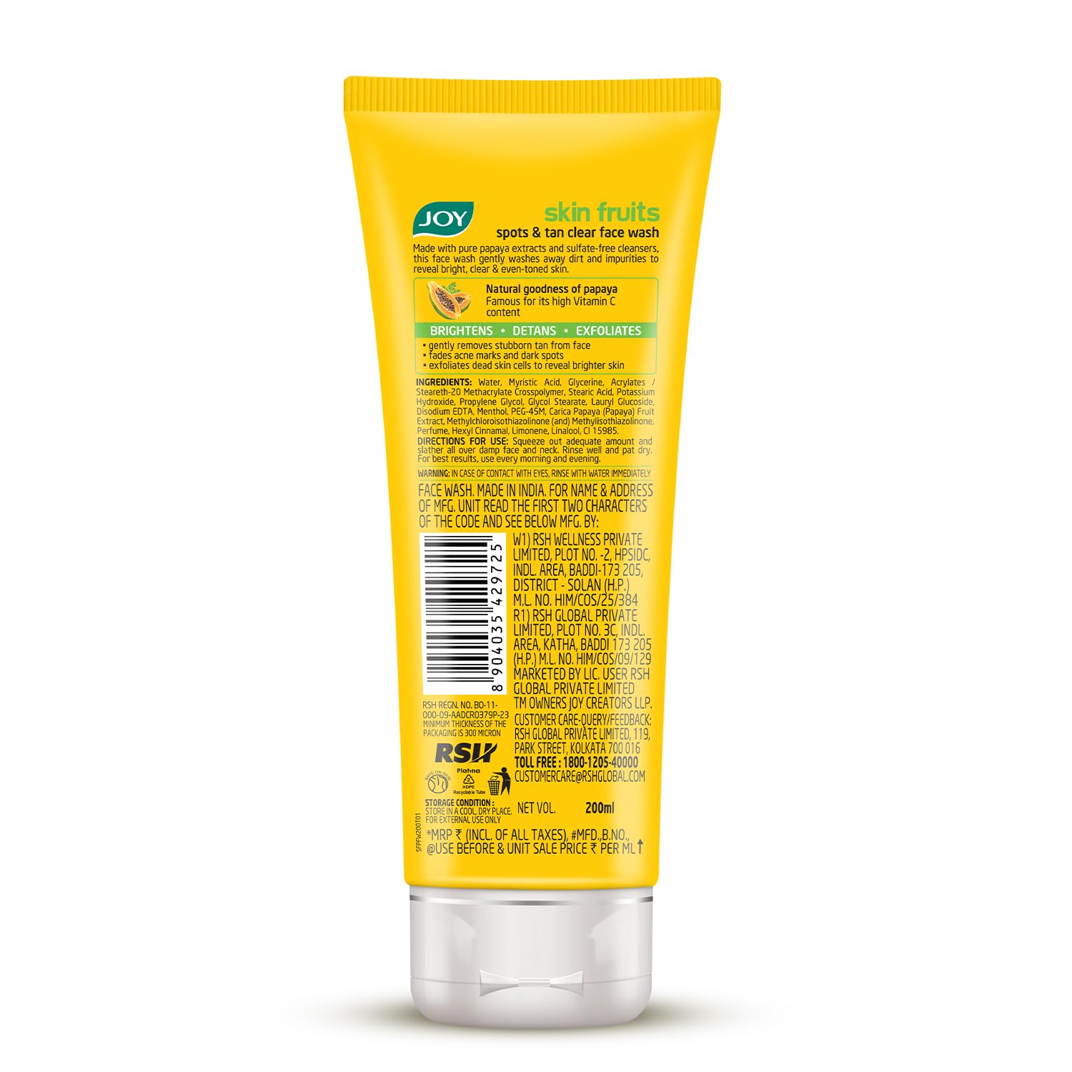 Yellow tube of JOY skin fruits face wash on a white background