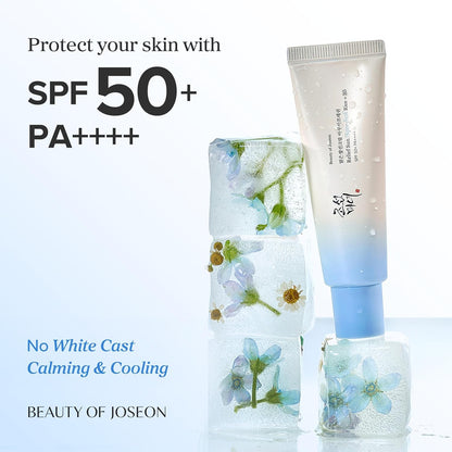 Skincare products with floral design and SPF 50+ text on a white background