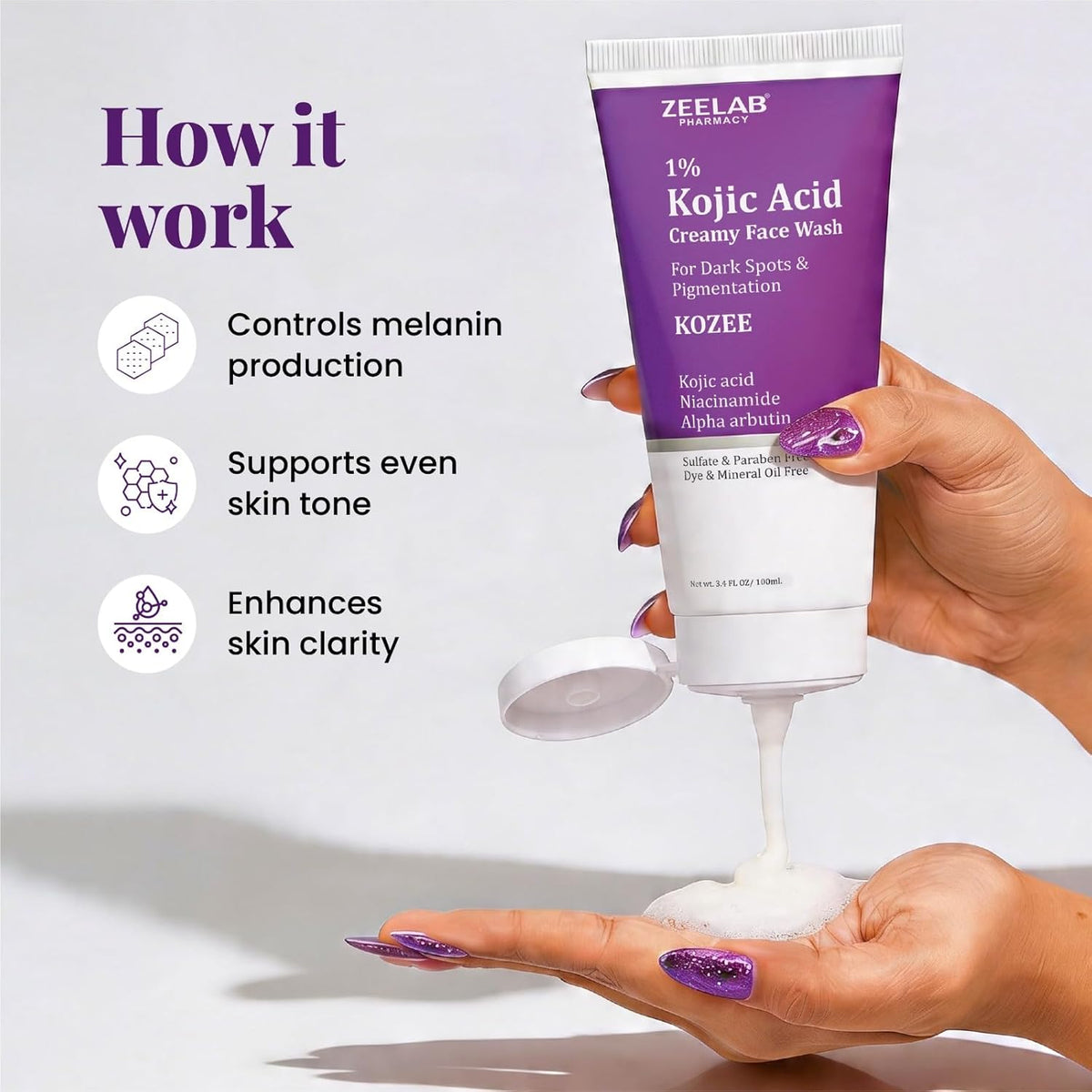 ZeeLab Kojic Acid Creamy Face Wash being held with product details on a light gray background