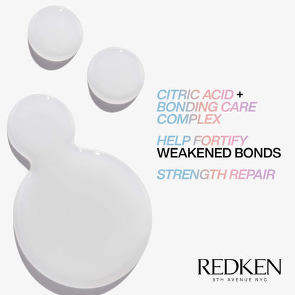 Redken product with text on a white background